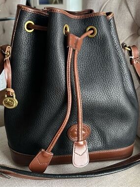 Dooney & Bourke Vintage Navy Blue/Tan Pebbled Leather Drawstring Bucket Bag
